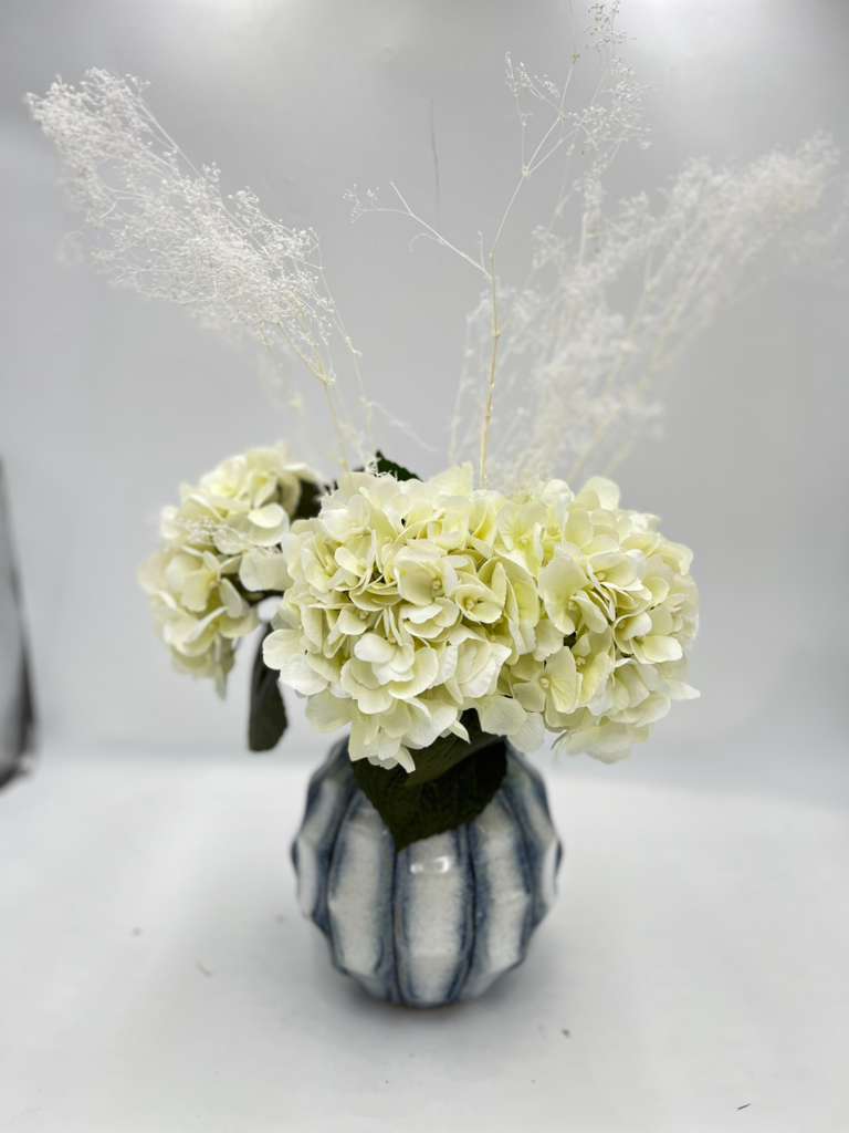 BLUE VASE FLORAL ARRANGEMENT