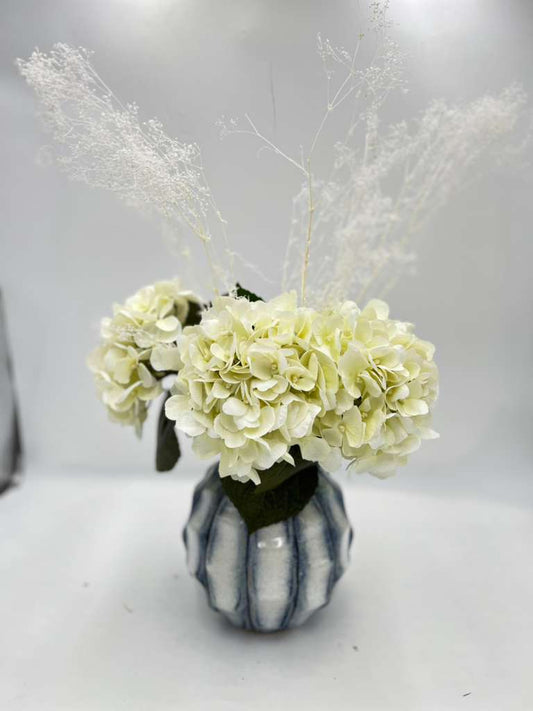 BLUE VASE FLORAL ARRANGEMENT
